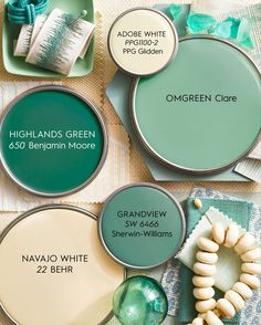 three different shades of green and white paint with the names of each one on them