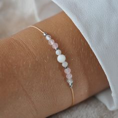 ✦ Moonstone Bracelet with  rose quartz, zircon, hematite, Delicate adjustable bracelet, Gemstone Minimalist Bracelet,  Everyday Bracelet ✦ This bracelet made of beige jewelry string and natural stones with a size of 2mm to 4mm. ✔ moonstone ✔ rose quartz ✔ zircon ✔ silver hematite ✦ The bracelet is adjustable thanks to the macrame weaving technique, it is comfortable to put on.  The nylon string makes the bracelet very durable ✦ Your bracelet will be packed in a hand made envelope with a brand logo, making it perfect for gifting  ✦ If you want to give jewelry to a loved one and leave a message for them, give me its content in the message when buying  ✦ Perfect bracelet: ✦ * for myself :) * as a gift for mom/sister/friend * as a thank you to the bridesmaid * as a gift for girlfriend/fiancée/ Adjustable White Rose Quartz Jewelry, Adjustable Minimalist Crystal Bracelet, Adjustable Modern Crystal Bracelet As Gift, Adjustable Modern Crystal Bracelet For Gift, Modern Adjustable Crystal Bracelet As Gift, Adjustable White Rose Quartz Beaded Bracelets, Delicate Adjustable Pink Crystal Bracelet, Adjustable Silver Bracelet With Rose Quartz, Adjustable Rose Gold Bracelets With Natural Stones