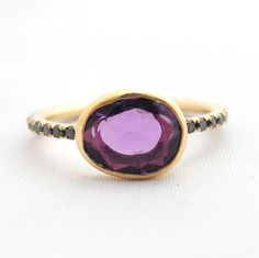 amethyst Elegant Black Amethyst Gemstone Ring, Elegant Black Amethyst Ring, Luxury Amethyst Rings With Rose Cut Diamonds, Elegant Black Amethyst Promise Ring, Amethyst Ring With Rose Cut Diamonds, Oval Shape, Modern Purple Amethyst Ring With Accent Stones, Purple Rose Cut Diamond Rings In 14k Gold, Purple 14k Gold Rings With Rose Cut Diamonds, Purple 14k Gold Ring With Rose Cut Diamonds