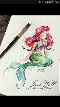 a watercolor drawing of a mermaid sitting on top of a piece of paper