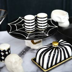 black and white halloween desserts with gold accents