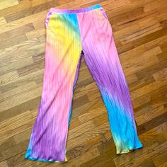 These Pants Are So Adorable And Very Comfy And Soft With Pockets. They Have A Soft Lightweight Lining On The Inside And Beautiful Pastel Colors Of The Rainbow. I Believe There Is A Matching Top Which I Do Not Have, I Could Be Wrong Tho. Approx Measurements Waist 15.5” Inseam 32” Length 43” Rise 12” Colorful Wide Leg Bottoms For Spring, Straight Pants For Summer Pajama Party, Trendy Colorful Pants For Spring, Trendy Colorful Spring Pants, Wide-leg Pants For Pajama Party In Summer, Multicolor Relaxed Fit Bottoms For Pajama Party, Multicolor High-waisted Loungewear Pants, Multicolor High-waisted Pants For Loungewear, Multicolor High-waisted Lounge Pants