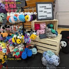 there are many crocheted items on display