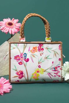 Inspired by the enchanting Primulaceae family of flowers, native to western and southern Europe renowned for their captivating colors. Our Primrose handbag brings these radiant hues to life through a collection of handpicked bright-colored floral prints. The perfect companion for your summer outfits. Whether you are strolling along the beach or attending a garden party complete your summer look with our primrose handbag. Width: 9" (23 cm) Base: 4" (10 cm) Height: 7" (18 cm) Sling Drop length:6" Potli Bag, Embroidered Clutch, Cap Patterns, Potli Bags, Southern Europe, Handbags Casual, Pattern Steps, Vintage Purses, Antique Metal