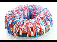 a bundt cake with red, white and blue sprinkles on it