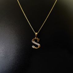 This is an exquisite initial diamond charm pendant set in 14K Solid Gold.  An elegant design, perfect for any occassion ITEM DETAILS: ✓ Letter  : S ✓ Gold Kt: Solid 14K Yellow Gold ✓ 14 K Gold Weight : 1.14 grams ✓ Diamond Shape/ Cut: Round Brilliant ✓ Diamond weight: 0.08 carats  ✓ Diamond No.: 8 Natural Diamonds ✓ Diamond Color: I-J ✓ Diamond Clarity: SI ✓ Gross Weight: 1.16 grams >>The Gold purity is guaranteed and it comes with authentic 14K gold hallmark. >>Jewlery Report provided as well certified by International Gemological Institute (IGI). >>A-Z letters available on my Etsy Shop. CUSTOMER SUPPORT: We are available 24/7 to respond to all your queries! PACKAGING: The pendant comes in layers of safe and secure wrapping along with a free Handmade Jewelry Box. S Pendent Designs, Initial Pendant Necklace With Diamond Accents For Anniversary, Anniversary Initial Pendant Necklace With Diamond Accents, Yellow Gold Diamond Necklace With Initials For Anniversary, Anniversary Pendant Necklace With Diamond Accents, Anniversary Yellow Gold Diamond Necklace With Initials, S Pendant Letter Gold, Gold Initial Necklace With Single Diamond For Anniversary, Yellow Gold Diamond Initial Pendant Necklace For Anniversary