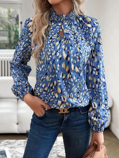 Sophisticated Hollow Printed Mock Neck Blouse with Long Sleeves Light Blue Long Sleeve Printed Blouse, Light Blue Printed Long Sleeve Blouse, Light Blue Printed Long Sleeve Tops, Light Blue Long Sleeve Printed Tops, Blue Stretch Shirt For Fall, Blue Long Sleeve Blouse For Fall, Long Sleeve Blue Blouse For Fall, Blue Non-stretch Long Sleeve Blouse, Blue Long Sleeve Non-stretch Blouse