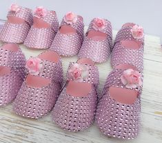 Your guests are going to LOVE these beautiful and unique bling baby girl shoe favors! These favors are great for baby showers or baptisms. Each shoe is made of quality cardstock and carefully covered with a pink bling diamond mesh. There is a pink rose attached to the strap. Each shoe measures approximately 4 inches long and approximately 2 inches wide. You can hand them out as is, or put some candy in them. Either way, they make perfect favors! This listing is for 5 pairs, for a total of 10 sho Fondant Baby Shoes, Bling Baby Shoes, Baby Shower Themes Neutral, Barbie Theme Party, Custom Sneakers Diy, Fondant Baby, Barbie Theme, Diamond Bling, Unique Favors