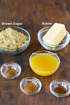 the ingredients to make homemade peanut butter are shown in small glass bowls on a wooden table