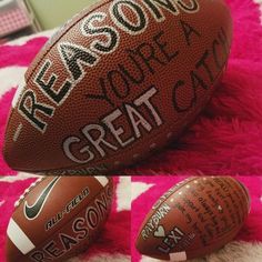 two footballs with the words reason and reason written on them sitting on a pink carpet