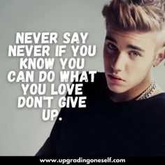 a person with a black shirt and a quote on it that says never say never if you know you can do what you love don't give up