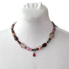 This Is A New With Tags Chico's Handcrafted Beaded Necklace. Features - Glass Beads Faux Red Pearls Plastic Beads Slivertoen Metal Beads Adjustable Lobster Clasp Colors - Red, Pink, Silver, Peach Condition: New With Tags Adjustable Red Beaded Necklace With Gemstone Beads, Czech Glass Beaded Necklaces With Round Beads, Colorful Czech Glass Beaded Necklaces, Handmade Burgundy Beaded Necklaces As Gift, Handmade Burgundy Beaded Necklaces For Gifts, Red Bohemian Crystal Necklace With Colorful Beads, Handmade Burgundy Necklaces With Round Beads, Adjustable Red Crystal Necklaces With Colorful Beads, Bohemian Burgundy Beaded Jewelry