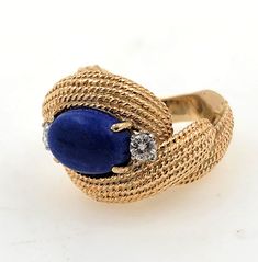 Beautiful Handmade 14K Solid Yellow Gold Oval Lapis Lazuli Accented Diamonds Cocktail Statement Ring September birthstone. Beautiful gift for someone you love! Ring size: 7  (adjustable upon request). Ring width approximately 3.9mm from the bottom and approximately 16.2mm from the top of the ring. Total diamond weight approx.: 0.24 ct. Total Lapis Lazuli weight approx.: 3.0 ct. Lapis Lazuli measurements: 11 x 8mm Total ring weight: 13.2 grams. Hallmarks: 14K  Will be put in a box, perfect for gi Modern Luxury Jewelry In Lapis Lazuli, Luxury Modern Lapis Lazuli Jewelry, Luxury Adjustable Lapis Lazuli Jewelry, Luxury Gold Lapis Lazuli Jewelry, Luxury Faceted Lapis Lazuli Jewelry, Lapis Lazuli Jewelry Rings, Luxury Lapis Lazuli Ring Jewelry, Luxury Lapis Lazuli Rings For Gift, Luxury Lapis Lazuli Cabochon Rings