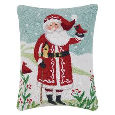 a christmas pillow with santa claus holding a bird in it's hand, on a white background