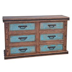 an old wooden dresser with blue drawers