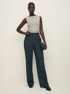 No nonsense. Shop the Risa Pant from Reformation, a low rise pant with a relaxed leg and buckle detailing at the waist. Tailored Mid-rise Bottoms With Belt Loops, Versatile Straight Leg Dress Pants With Belt Loops, Chic Mid-rise Wide Leg Pants With Belt Loops, Modern Mid-rise Workwear Bottoms, Versatile Mid-rise Pants With Belt Loops, Modern Mid-rise Workwear Pants, Modern Mid-rise Bottoms For Business Casual, Chic Mid-rise Wide Leg Pants For Business Casual, Fitted Mid-rise Wide Leg Pants With Belt Loops