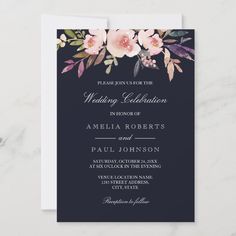 an elegant navy blue wedding card with pink flowers