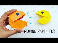 someone is holding an origami toy in their hand and it says moving paper toy