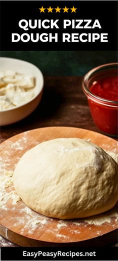 a pizza dough is sitting on a wooden board