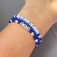 Show your team spirit with these fun bracelets. Whether you're a mom cheering on your son/daughter or just enjoying your favorite sport. Great gift for a team mom and all those helping make sports possible! I can customize these to fit your team/school colors.  Customize with the team name, players name, players jersey #, football mom, soccer mom, etc.  Mix n match with my other bracelets for endless styles! You will receive 3 bracelets that are made on strong stretch cord and made to fit a 7 1/ Personalized Blue Bracelets For Game Day, Blue Adjustable Beaded Bracelets For Team Spirit, Blue Beaded Bracelets For Team Spirit Gift, Blue Beaded Bracelets With Letter Beads For Team Spirit, Blue Team Spirit Beaded Bracelets As Gift, Personalized Blue Bracelets For Sports Events, School Spirit Letter Beads Bracelets Gift, Blue Adjustable Bracelets For Team Spirit, Adjustable Team Spirit Bracelets With Letter Beads