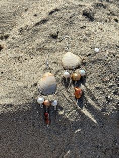 HANDMADE Seashell Earrings with Freshwater pearls - these beautiful shell earrings are made with handpicked shells from a beach in Long Island. With real freshwater pearls.