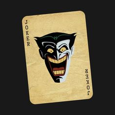 a joker playing card with an evil face