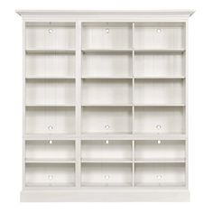 a white bookcase with many shelves and drawers on it's sides, against a white background