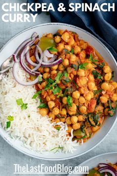 chickpea and spinach curry in a bowl with rice