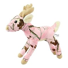 a pink stuffed animal with brown spots on it's face and legs, in camouflage print