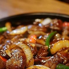 a close up of food in a pan on a table