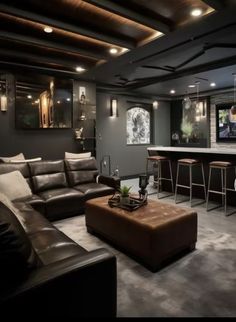 a living room filled with furniture and a bar in the middle of it's walls