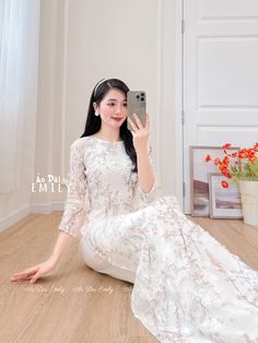 🌻This listing is for 1 long dress Pre-made ao dai (Vietnamese long dress) for women/girls. Material: Double layers voan/silk - Stretchy level : 0/10 🌻 The measurement of this ao dai (long dress) is in Vietnamese size (American size tends to be bigger for the same size). Please LOOK AT THE SIZE CHART CAREFULLY BEFORE ORDERING. There might have some chalk writings on the fabric due to making process. These marks can be washed away easily. 🌻🌻No returns or exchanges Buyer can contact seller about any issues with an order. 🌸 Follow us Facebook/aodaiemily www.aodaiemily.com 💜 Thank you very much!💜 White Long Cheongsam For Spring, White Long Sleeve Ao Dai With Floral Embroidery, White Ao Dai With Floral Embroidery Long Sleeve, White Ao Dai With Floral Embroidery And Long Sleeves, Floor-length Ao Dai For Spring Wedding, Summer Wedding Ao Dai In Maxi Length, Summer Wedding Ao Dai With Long Sleeves, Spring White Ao Dai With Floral Embroidery, Spring Party Ao Dai, Floor-length