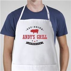 a man wearing an apron with the words andy's grill in red and white