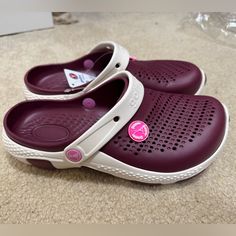 Crocs Shoes For Women. Comfy Shoes For Women. Not Gonna Make Your Feet Hurt. Size: 39. Color: Dark Red Or Velvet. The Shoes Is A Little Smelly Because It Is New. Purple Synthetic Clogs, Casual Red Slip-on Clogs, Red Non-slip Casual Clogs, Red Non-slip Clogs With Round Toe, Red Beach Sandals With Cork-bed Midsoles, Red Non-slip Synthetic Clogs, Crocs Shoes, Comfy Shoes, Shoes Color