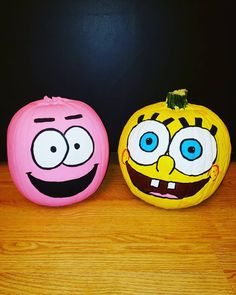 two pumpkins decorated to look like cartoon characters