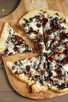 a sliced pizza sitting on top of a wooden cutting board