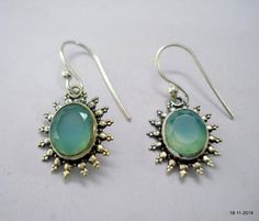 Ethnic Sterling silver earring pair from rajasthan india. great handmade design adorn with Chalcedony gemstone, good for your jewellery collection.Note - Pictures is part of Description. Please check pictures carefully for more detail.height with wire - 2.7 cm(1")width max.. - 1.3 cm(0.51")weight - 3 gramsmaterial - good sterling silver. Traditional Handmade Oval Jewelry, Traditional Brass Jewelry With Round Beads, Traditional Brass Jewelry With Polished Beads, Traditional Brass Bead Jewelry, Bohemian Jewelry With Round Beads For Diwali, Traditional Brass Round Bead Jewelry, Bohemian Round Beads Jewelry For Diwali, Bohemian Jewelry With Oval Beads For Festive Occasions, Polished Bead Earrings For Festivals And Gifts