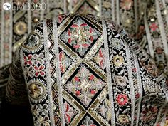 an elaborately designed purse is shown in this image