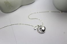 This fabulous heart shape locket with sparking CZ moon necklace is so unique but at the same time looks absolutely simple and timeless. When folded it has a shape of a heart that opens into a clover. This locket heart with moon star jewelry makes a perfect gift for a mom, grandmother and is an ideal gift for sweetheart photos. Lovely keepsake to keep or give as a gift. * 925 silver chain and clasp * Adorable Glossy Silver plated CZ north star, 24x28mm small star 7 mm . locket 13 mm Necklace Size Elegant Heart-shaped Moon Charm Jewelry, Elegant Heart-shaped Jewelry With Moon Charm, Locket Necklace Heart, Necklace Heart Locket, Moon Locket, Pic Photo, Jewelry Heart, Heart Locket Necklace, Back Necklace