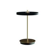 a black and gold side table with a metal base on an isolated white background,