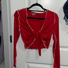 Never Worn Verge Girl Crop Top. Ties In The Front. Great Condition! Red Long Sleeve Trendy Crop Top, Trendy Red Long Sleeve Crop Top, Cute Red V-neck Top, Cute Red Party Top, Red Long Sleeve Cotton Crop Top, Cute Red Crop Top For Spring, Trendy Red Crop Top For Day Out, Verge Girl, Front Crop Top