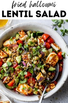 a white bowl filled with grilled halloumi and vegetables