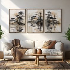 a living room with two paintings on the wall