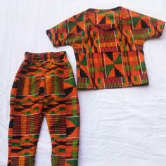 Listed. Matching African Kente Pants And African Kente Shirt. . Perfect For The Summers,Daytime Or Playtime. . Pair Pants With Listed Top From Shop For Everyday Wear Or Pair Shirt With Your Favorite Piece For Own Unique Look. . Item Can Be Customized. . All Items Are Made In Pet And Smoke Free Environment. . Please Contact Us For Pricing.