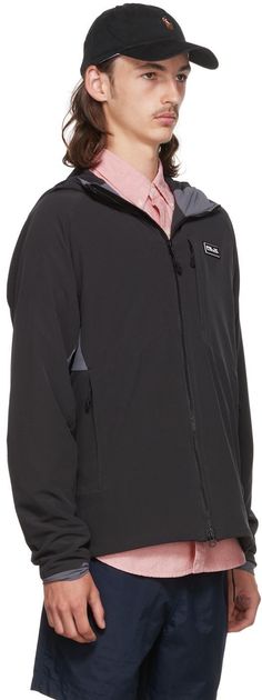 Padded stretch recycled polyester ripstop jacket. · Hood at stand collar · Two-way zip closure · Concealed zip pockets at front · Bonded trim at back · Rubberized logo patch at chest and back · Stretch recycled polyester ripstop lining Supplier color: Black Black Outerwear With Logo Patch For Work, Polyester Jacket, Polo Ralph Lauren Mens, Stand Collar, Patch Logo, Polo Ralph, Zip Pockets, Top Brands, Polo Ralph Lauren