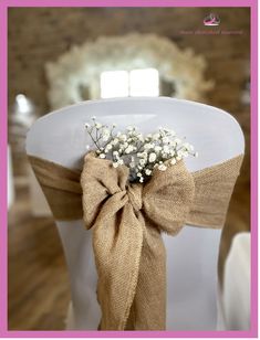 Hessian Bow with added Gypsophila for Wedding Chair Decorations. Wedding Decorations Traditional, Wedding Chair Decorations Diy Cheap, Wedding Chairs Decorations, Chair Bows Wedding, Wedding Chair Covers, Rustic Wedding Chair Cover Ideas, Burlap Wedding Chair Decor, Wedding Bows Decorations, Hessian Wedding Ideas