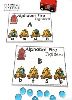 the alphabet fire fighters game is shown with blue buttons and an orange car on top