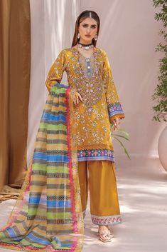 EMB Printed Cambric Front Printed Cambric Back Printed Cambric Sleeves Crystal Slub Dupatta Cambric Trouser Color: Mustard