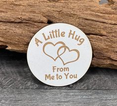 a little hug from me to you sticker on a piece of wood with the words,'a little hug from me to you '