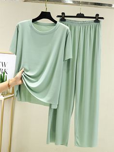 Sku CY-!107132 Material Ice Silk Style Loose , Wide Leg , Short Sleeves Feature Elasticity , Solid Color Neckline Round-neck Occasion Casual , Simple , Home Wear Seasons Spring , Summer Type Pajamas Color BLACK,YELLOW,IRON GRAY,LOTUS PINK,LIGHT BLUE,LIGHT GREEN Size M,L,XL,2XL Please consult the size chart we provide for this item's measurements to help you decide which size to buy.Please note: There may be 1-3cm differ due to manual measurement. CMINCH Bust Waist Hips Top Length Bottom Length Weight(kg) M 102 86 110 61 87 40-50 L 104 88 114 63 89 50-60 XL 108 90 117 65 90 60-70 2XL 112 92 120 67 92 70-82.5 Beach Blouse, Drape Maxi Dress, Solid Color Pants, Simple Home, Blouse Pants, Midi Dress Casual, Home Wear, Maxi Knit Dress, Loose Shorts